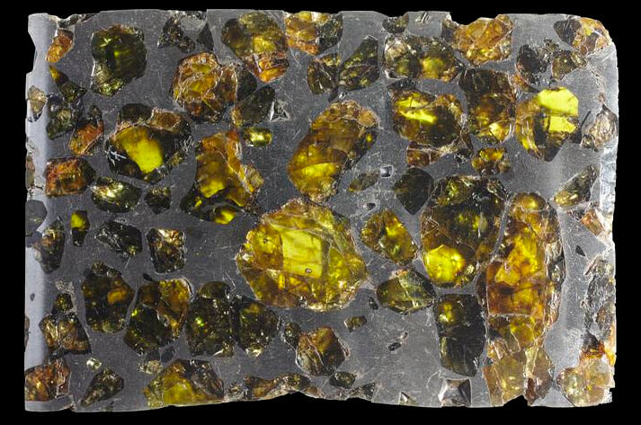 Golden-olivine-nickel-iron-meteorite.jpeg